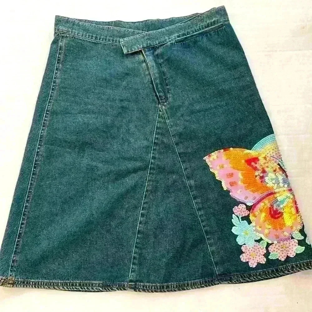 Jean skirt, size Medium with butterfly embellishment​